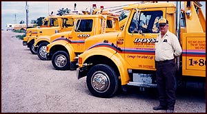 Fleet of Tow Trucks and Founder/President, Don Weaver